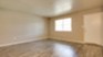 Ten Twelve West - Living - Photo 5 of 7