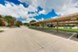 Oaks of North Dallas - Exterior/ Covered Parking - Photo 2 of 17