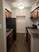 Village Manor - Kitchen - Photo 8 of 15