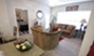 Sutton Oaks - Living - Photo 6 of 8