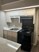 Center Chase - Upgraded Unit Kitchen - Photo 4 of 6