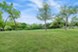 Cortland Bluff Springs - Exterior Grassy Area - Photo 4 of 37