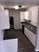 Woodlake Villas - Kitchen - Photo 3 of 4