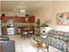 Oak Tree Manor - Model Living Area - Photo 3 of 9