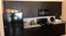 Apex - Kitchen - Photo 8 of 14