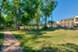 Pines at Woodcreek - Courtyard - Photo 5 of 31