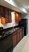Tucasa - Kitchen - Photo 3 of 4