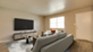 Ten Twelve West - Living - Photo 4 of 7
