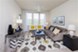 Emerald Village - Living - Photo 3 of 5