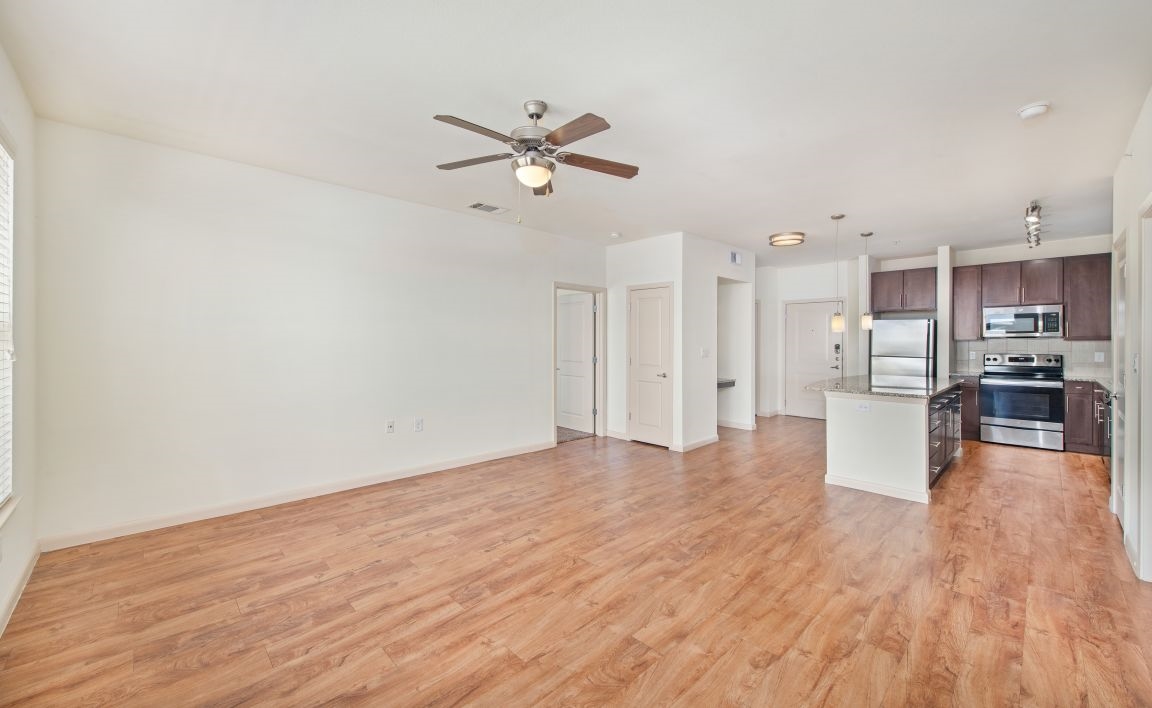 MAA Midtown Square I, II & III - Living/Kitchen - Photo 7 of 14