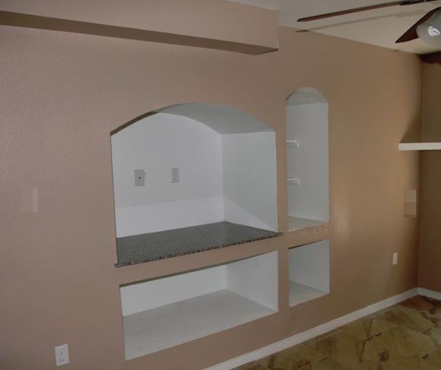 Palms Apartments & Townhomes - Living - Photo 6 of 8